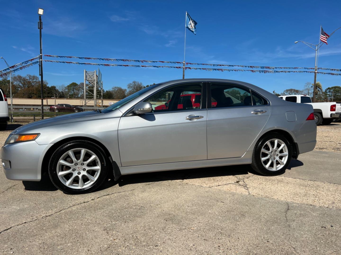 2006 Silver /Gray Acura TSX (JH4CL969X6C) with an 2.4 engine, Automatic transmission, located at 4520 Airline Hwy, Baton Rouge, LA, 70805, (225) 357-1497, 30.509325, -91.145432 - 2006 Acura TSX 2.4L 4 Cylinder, Auto, 126K Miles, Leather, Sunroof, Navigation, Power Windows, Locks & Mirrors, NO IN HOUSE FINANCING. FOR INFO PLEASE CONTACT JEFF AT 225 357-1497 CHECK OUT OUR A+ RATING WITH THE BETTER BUSINESS BUREAU WE HAVE BEEN A FAMILY OWNED AND OPERATED BUSINESS AT THE SAME - Photo#1